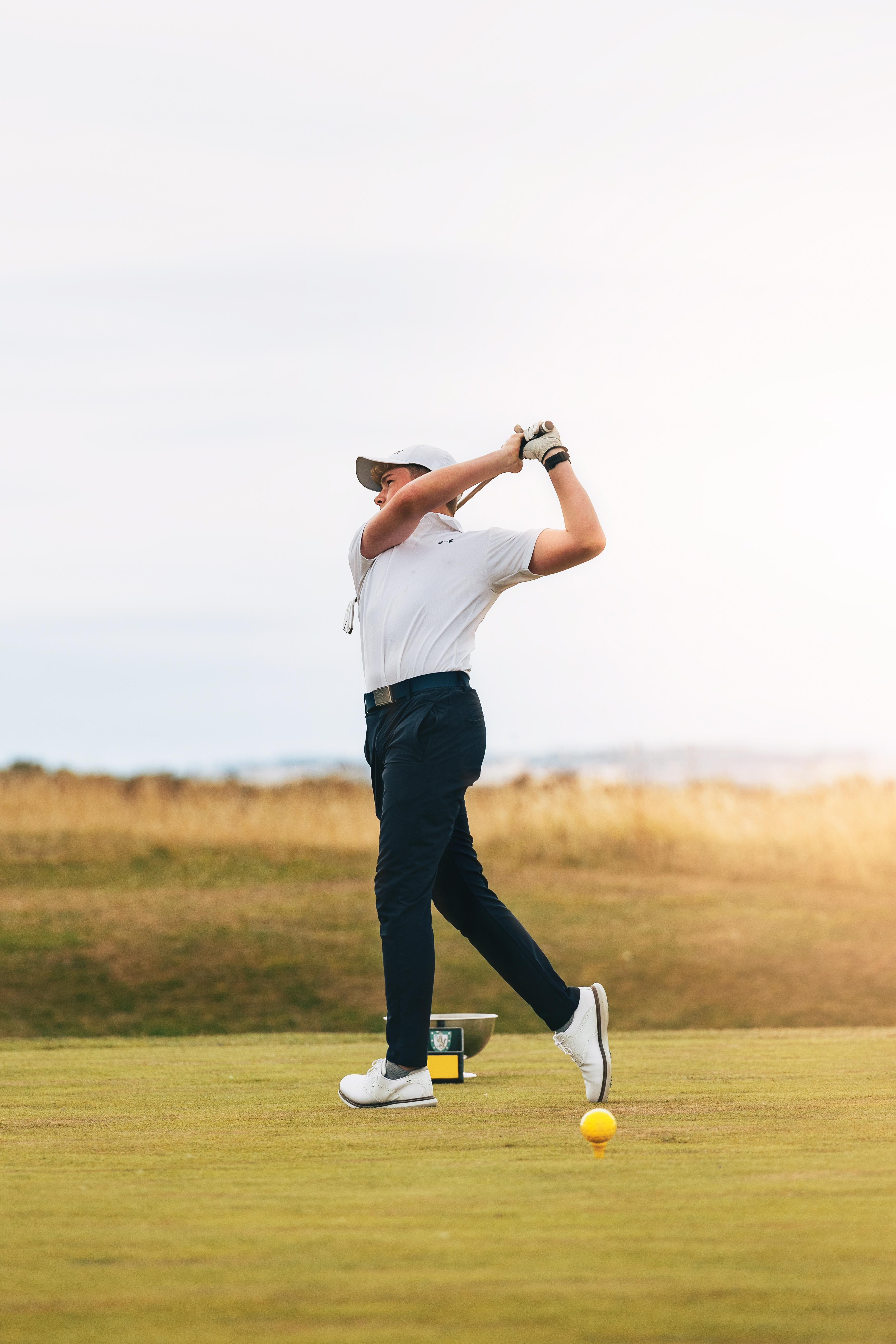 Dornoch Station Hotel Bagian luar foto Golf player