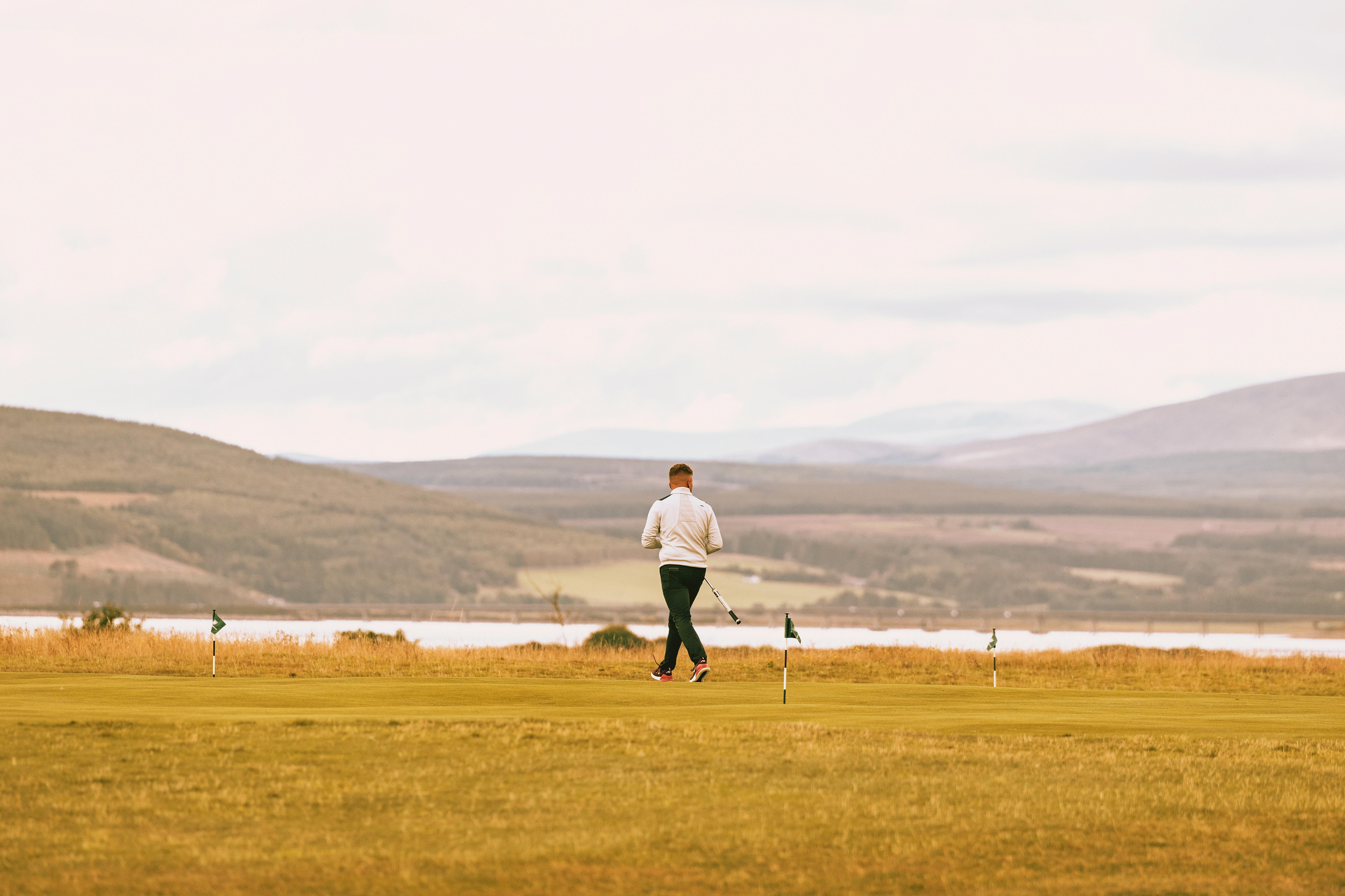 Dornoch Station Hotel Bagian luar foto A player on the 18th fairway